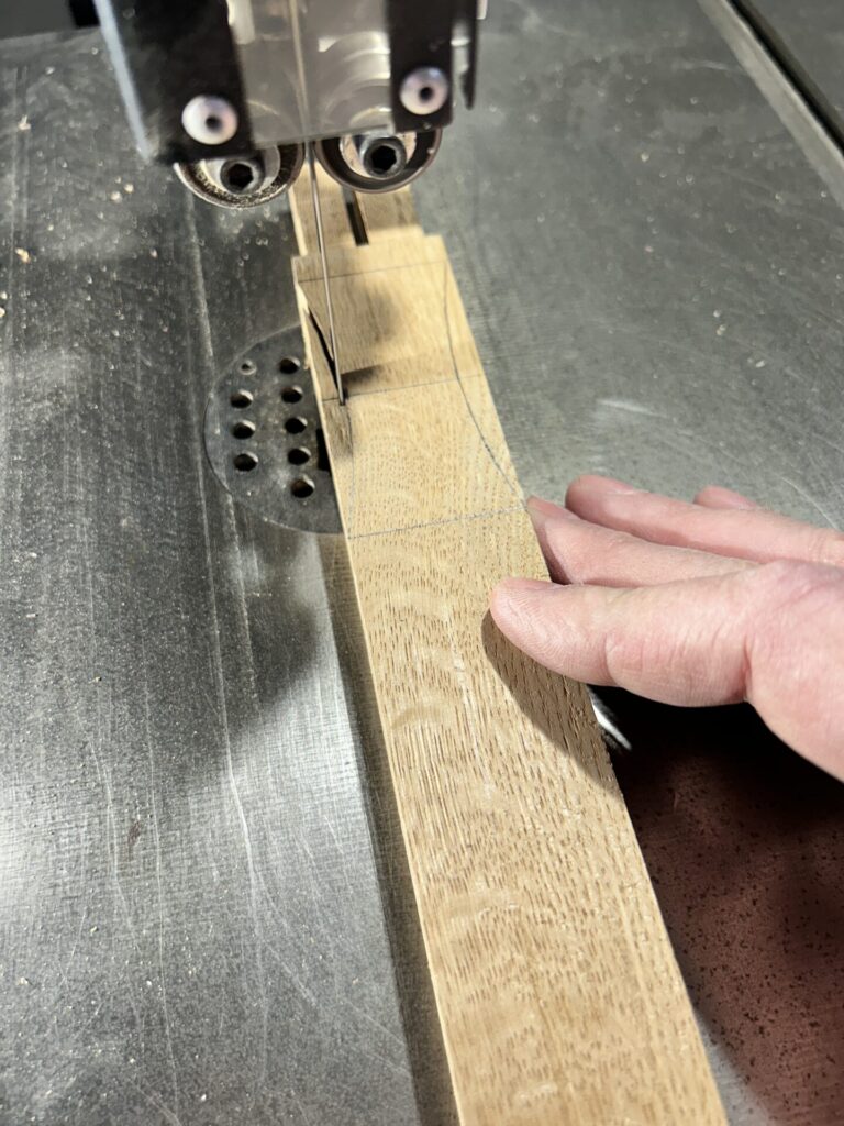 Cutting the relief cuts on the handle at the bandsaw