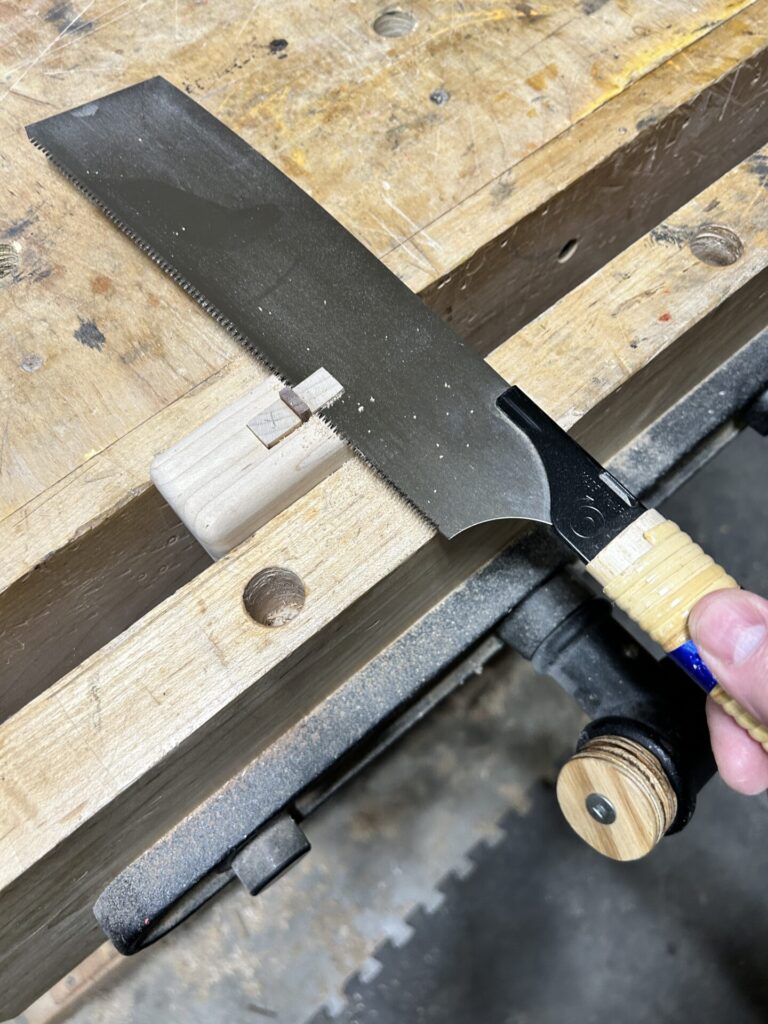 Flush-trimming the mallet handle to the head with a Japanese pull saw