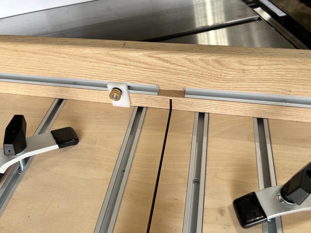 T-track stop on small parts crosscut sled for table saw