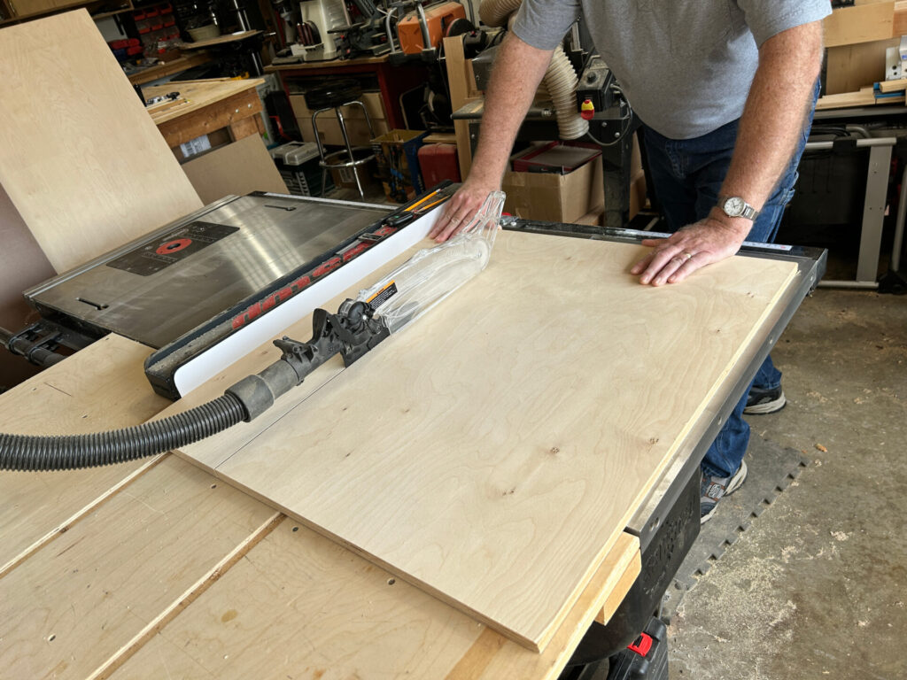 Ripping the base from a sheet of plywood